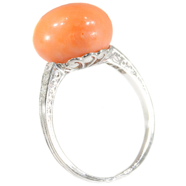 Typical platinum Art Deco diamond ring with coral